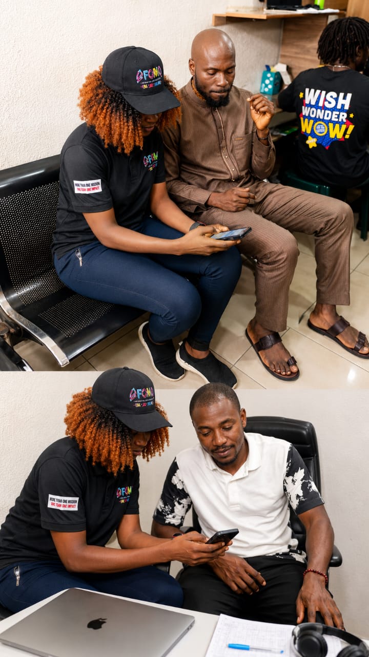 Afomo team with merchants at Emab Plaza electronics market